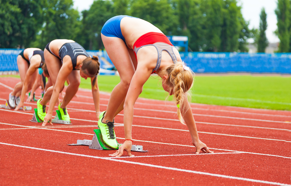 Female runners, getting on their marks